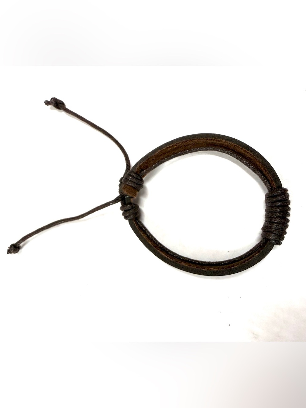 Brown leather unisex bracelet with braided rope accents and ties nsb